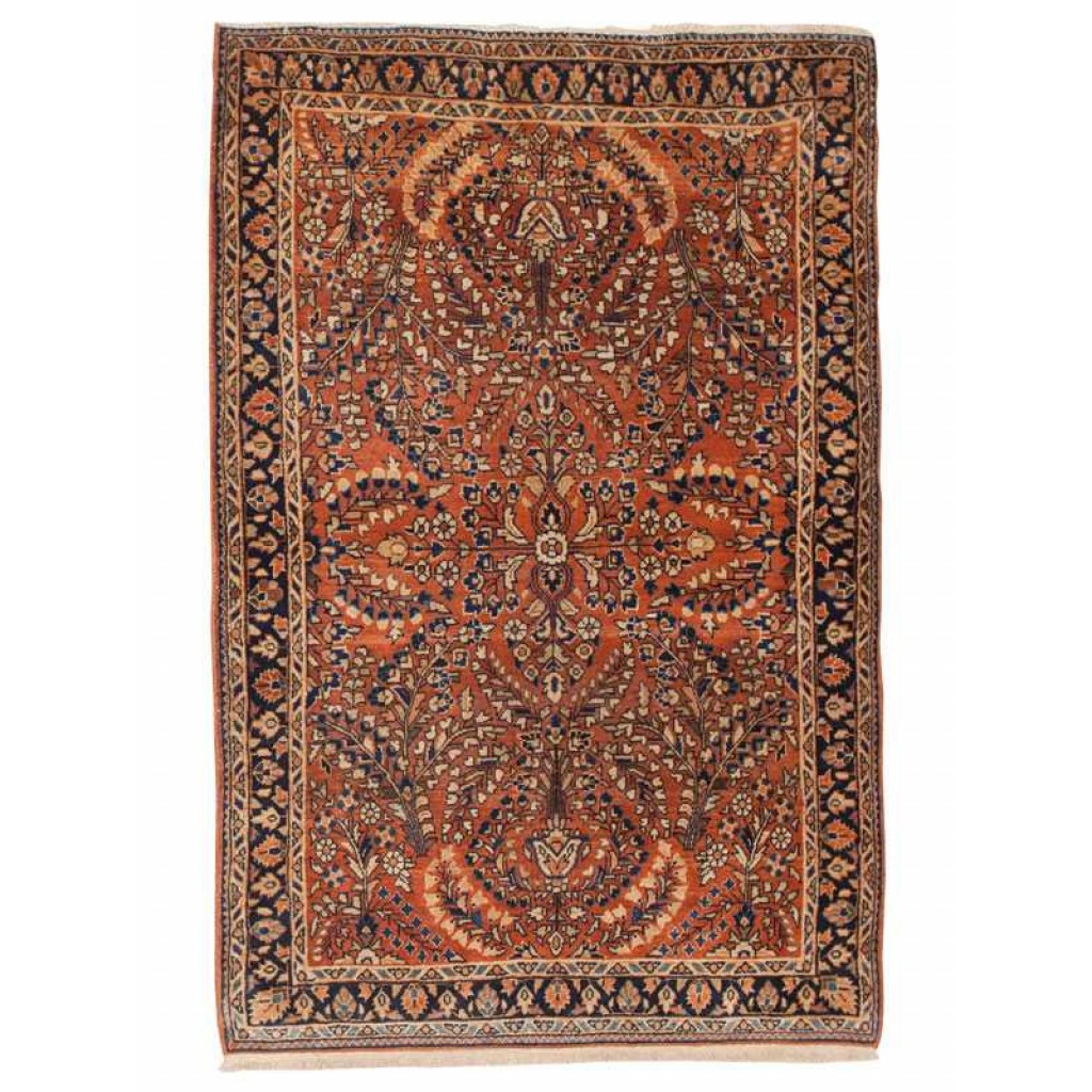 Tappeto saruq persiano antico con intricati dettagli decorativi floreali su sfondo arancione e sul bordo blu scuro