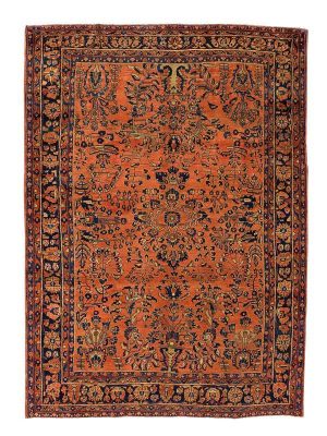 Tappeto saruq antico con intricati motivi decorativi blu su sfondo arancio