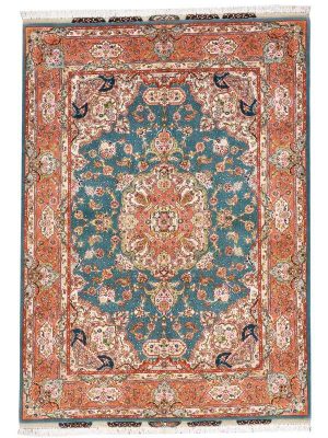 Tappeto persiano tabriz con medaglione centrale rosso, intricati dettagli decorativi floreali su campo blu e sullo spesso bordo rosso