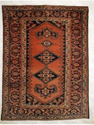 Tappeto Ferahan antico con doppio medaglione centrale su fondo arancio e dettagli decorativi floreali sullo spesso bordo