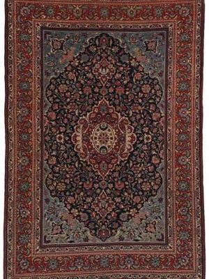 Tappeto Isfahan antico con medaglione centrale rosso su campo blu e intricati dettagli decorativi floreali su tutto il campo blu e sullo spesso bordo rosso