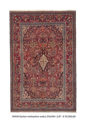 Tappeto persiano keshan motashem con medaglione centrale bianco e blu su campo rosso e intricati dettagli decorativi su tutto il campo e il bordo rosso del tappeto