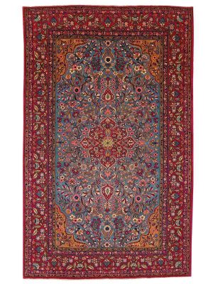 Tappeto Keshan antico con medaglione centrale rosso e intricati dettagli floreali sul fondo blu e sullo spesso bordo rosso