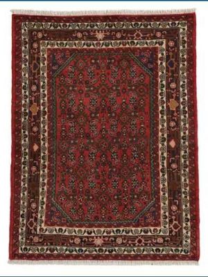 Tappeto persiano Hossenabad con decorazioni geometriche floreali a tutto campo, su sfondo rosso e con spesso bordo bianco e rosso