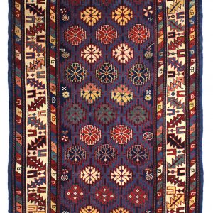 tappeto caucasico kazak antico, con motivi decorativi geometrici astratti a tutto campo e spesso bordo