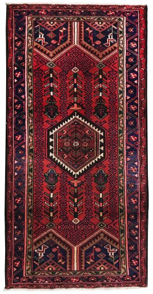 tappeto classico persiano sirjan rosso, con medaglione centrale e motivi decorativi floreali geometrici