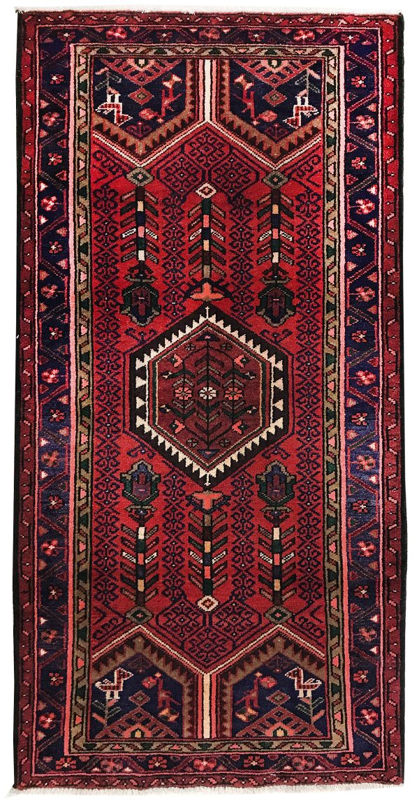 tappeto classico persiano sirjan rosso, con medaglione centrale e motivi decorativi floreali geometrici
