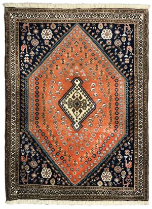 tappeto persiano originale abadeh arancione e nero, con medaglione centrale bianco e decorazioni geometriche stilizzate di piante, fiori, animali e simboli