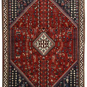 tappeto persiano originale abadeh rosso e nero, con medaglione centrale bianco e decorazioni geometriche stilizzate di piante, fiori, animali e simboli