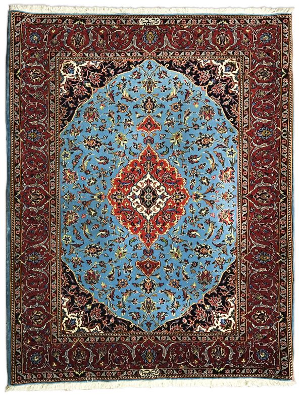 tappeto persiano keshan jehad azzurro e nero, con spesso bordo e medaglione centrale rosso, decorato con motivi floreali