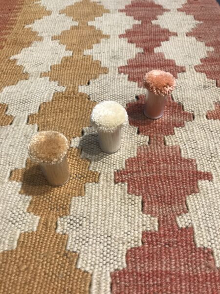 pom pom materiali tappeti kilim