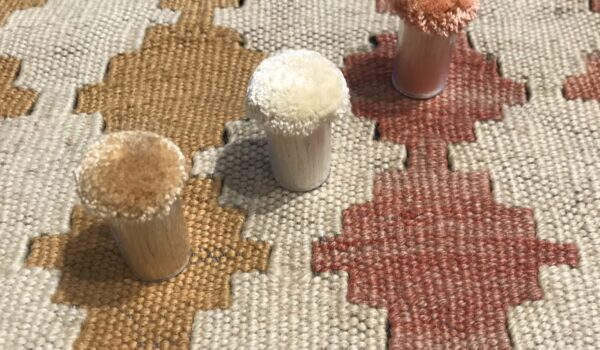 pom pom materiali tappeti kilim